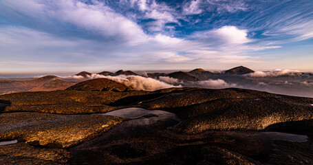 Early morning sunrise on Slieve Binnian in The Mourne mountains, wild camp, County Down, Northern Ireland