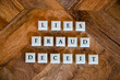 © Benjamin - Letter blocks spelling out the words fraud deceit and lies