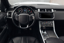 Expensive Suv Car Interior With Steering Wheel, Multimedia Dashboard And Gearbox Handle