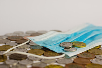 Money (czech crowns) and face mask on white background