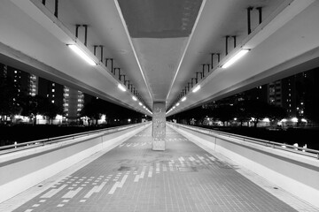 Poster - Empty foot bridge and pedestrian walkway at night