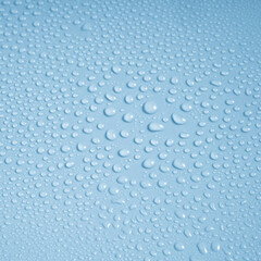 Sticker - Water drops on blue background