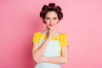 Canvas Print - Portrait of minded girl maid touch hands chin plan ponder solution wear hair rollers isolated on pink color background