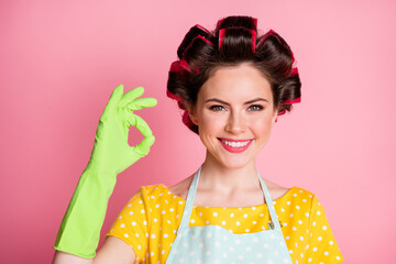 Poster - Portrait of positive girl show okay sign wear yellow dotted t-shirt rubber gloves isolated over pastel color background