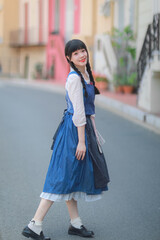 Young Asian women in retro dress traveling on the street of Monaco