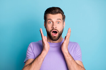 Canvas Print - Photo of young handsome man amazed shocked surprised news sale rumor isolated over blue color background