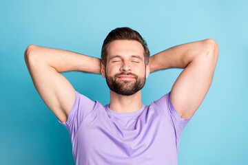 Poster - Top above high angle view photo of young attractive man enjoy free time rest relax hands behind head isolated over blue color background