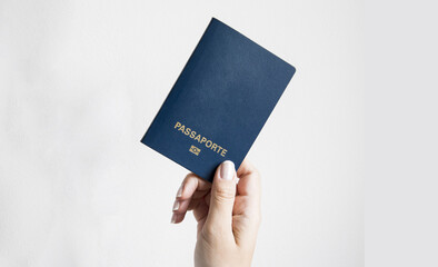 Wall Mural - A woman holding passport. white background. accidental