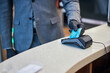 © Viacheslav Yakobchuk - Business professional sweeping his card on a terminal