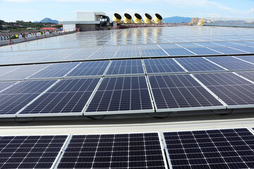 Sticker - Solar PV System on Industry Roof with Cooling Towers Background