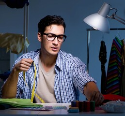 Male tailor working in sewer shop