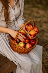 woman with basket of apples