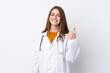 © luismolinero - Young woman over isolated background wearing a doctor gown and making phone gesture