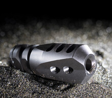 Rifle Muzzle Brake On Black Sand