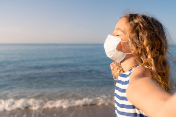 Sticker - Happy child wearing medical mask outdoor