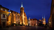 The evening wiew of the church of the Holy Cross and the twin towers of St. John's cathedral in the oldest part of Wroclaw (called Tumski Island), Poland