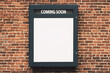 © Who is Danny - Blank white Coming Soon banner on brick wall, mockup