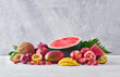 © Ana Gomez/ADDICTIVE STOCK - Set of assorted sweet exotic fruits and berries arranged on table in studio