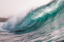 Powerful Turquoise Breaking Ocean Waves With White Foam