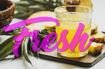 Canvas Print - selective focus of pineapple juice in glass near delicious fruit on cutting board and fresh lettering on white