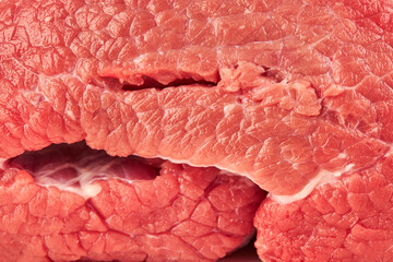 Texture of a red raw meat close up