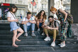 © guruXOX - Group of friends using smartphones together. Young people addiction to new technology trends. Youth, new generation internet friendship concept. Emotional isolation and depresion