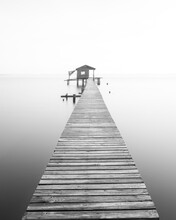 Scenic View Of Old Boathouse Along Saint Johns River On Foggy Morning