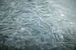 © Tandem Stock - Close up of ice pattern on surface of frozen lake