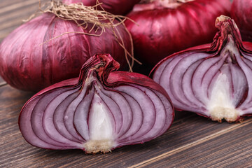 red onions on rustic wood