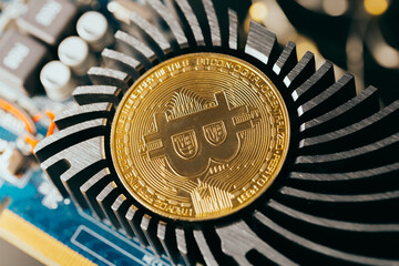 Wall Mural - Gold bitcoin and new virtual money for the electronic processor. Cryptocurrency concept.