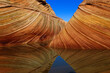 The WAVE with Multiple Water reflections of Sandstone Strata in Coyote Buttes Area of Vermilion Cliffs National Monument, Arizona, USA