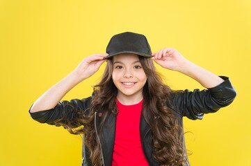 Wall Mural - Find your inner hipster. Happy little hipster fix cap yellow background. Fashion look of small child. Wearing casual style. Trendy outfit and accessory. Childrens wear. Cool and stylish