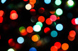 © makanna - Abstract of colorful background. Bokeh light. shimmering blur spot lights on multicolored abstract background. Christmas holiday