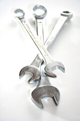 Wrenches on white background - close-up