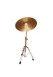 © Kristians Berents/Wirestock - Golden drum cymbal on racks isolated on a white background