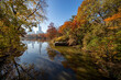 © GORDON - Trees around Bank Rock Bay and Oak Bridge reflect off the Lake from in Central Park, New York City.