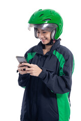 Wall Mural - asian beautiful delivery courier with helmet holding smartphone isolated over white background