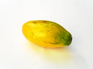 Sticker - A fresh juicy sweet papaya isolated on a white background