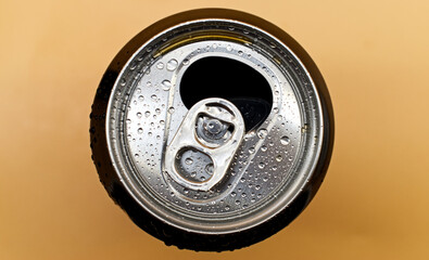 Top view of drink can isolated on orange background