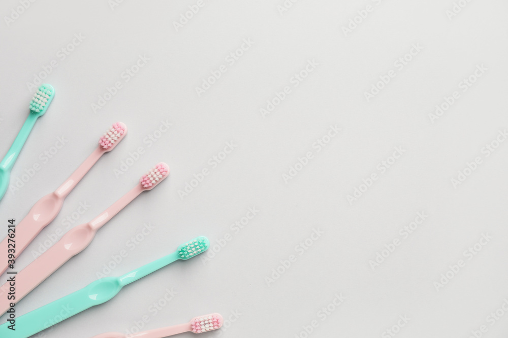 Toothbrushes on light background