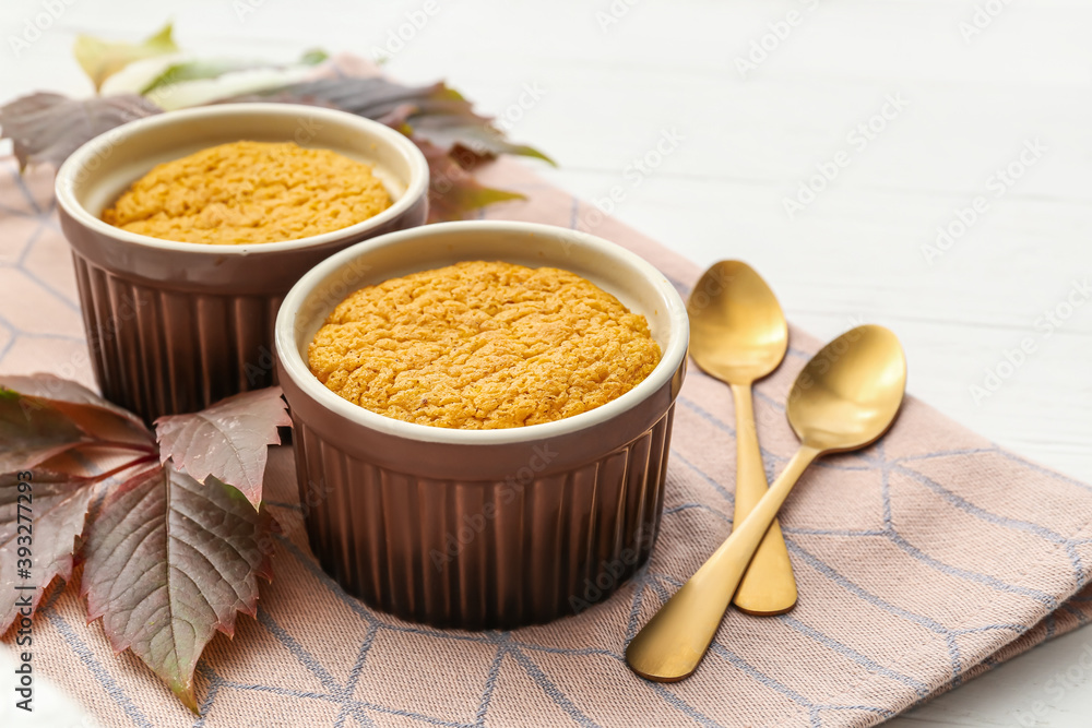 Tasty pumpkin pudding on table