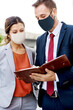 © Rawpixel.com - Business people in face mask working in new normal
