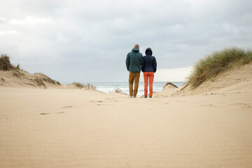 Misty morning stroll on beach