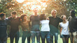 © Rawpixel.com - Cheerful diverse people huddling in the park