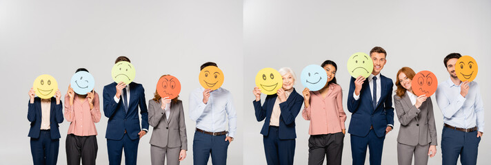 Collage of multicultural businesspeople holding cards with emotions isolated on grey, banner