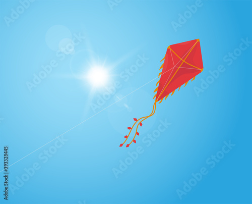 Flying kite in the sky © ikonstudio