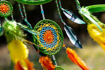 Wall Mural - Handmade dream catcher with feathers threads and beads rope hanging