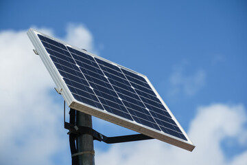 solar panel that supplies energy to the lights of a pedestrian crossing