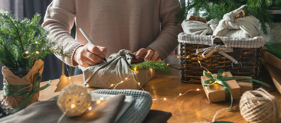 Wall Mural - christmas gifts. new year and gift wrapping, zero waste furoshiki, eco friendly gift wrapping in kra