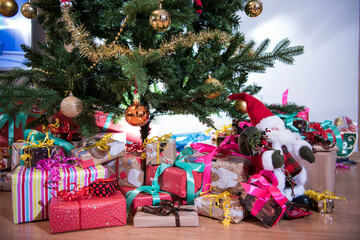 Wall Mural - Gifts on the floor under the Christmas tree.